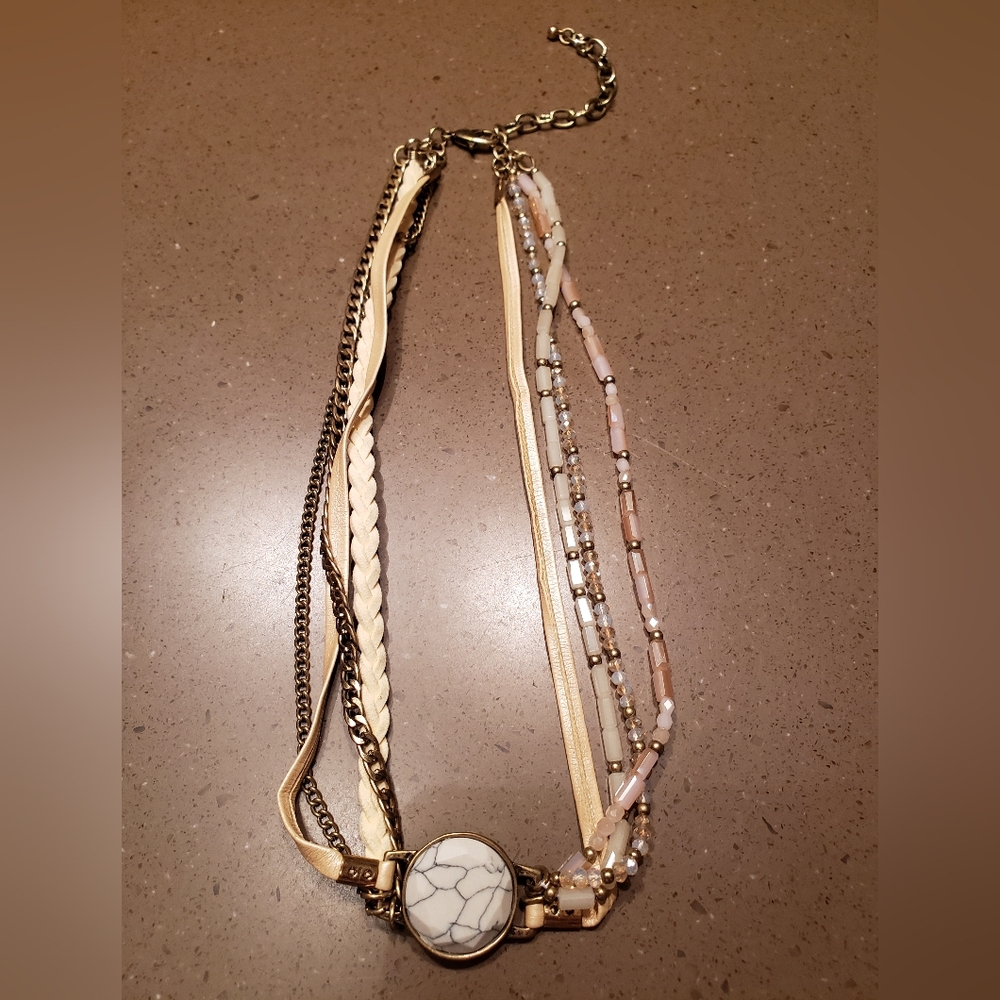 Butter yellow cords, gold chains, & beaded necklace